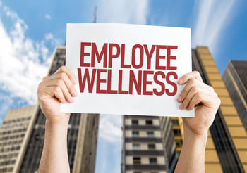 Employee Benefits placard with cityscape background-1